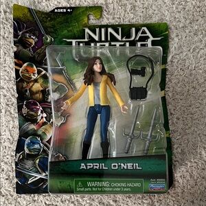 Teenage Mutant Ninja Turtles April O'Neil Action Figure - Yellow and Blue